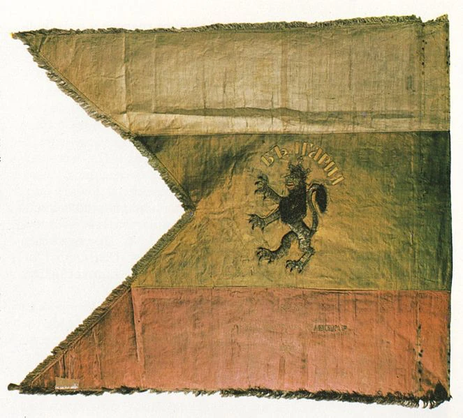 Old cloth flag with white, green and red stripes and an embroidered lion