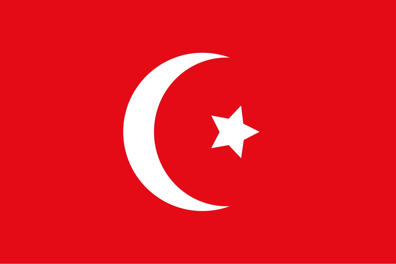 Red flag with a white crescent and star