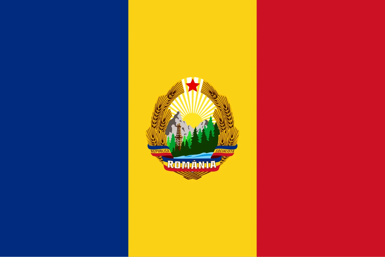 Bandera blava, groga i vermella amb l'escut comunista al centre